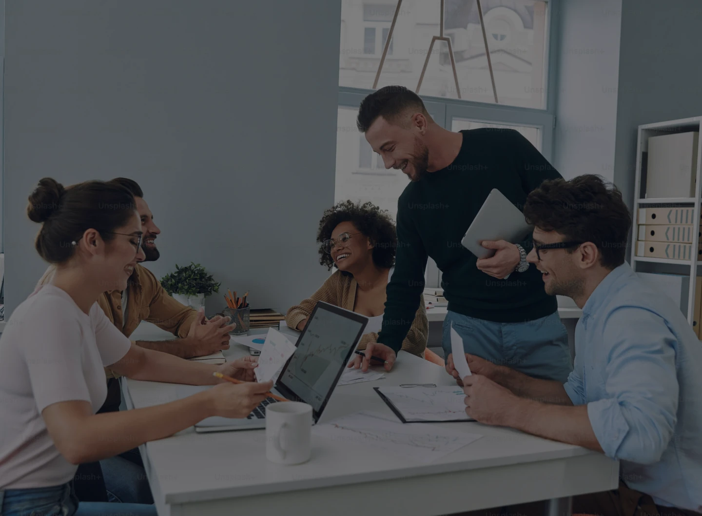 Colleagues collaborating around a table